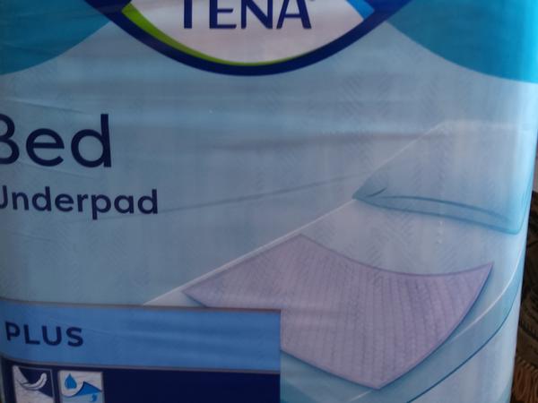 Пелюшки гігієнічнч  Tena Bed Plus фото